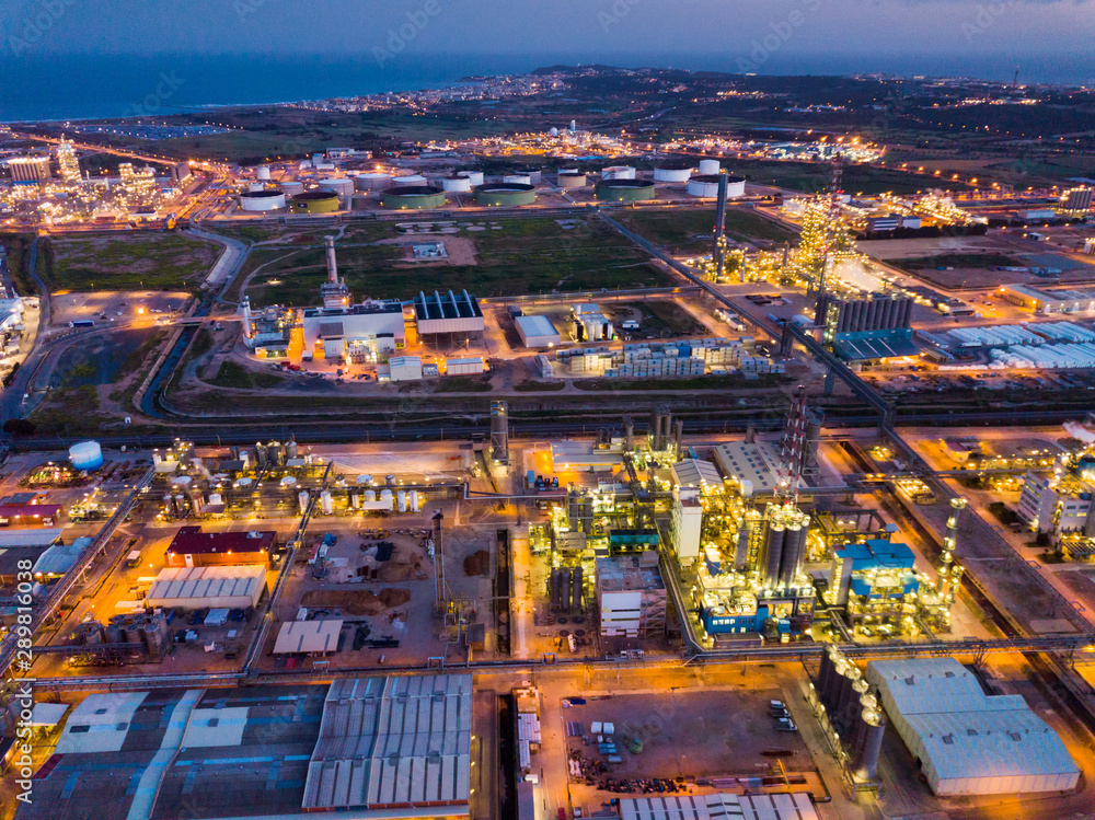 Night aerial view of chemical plant next to Salou