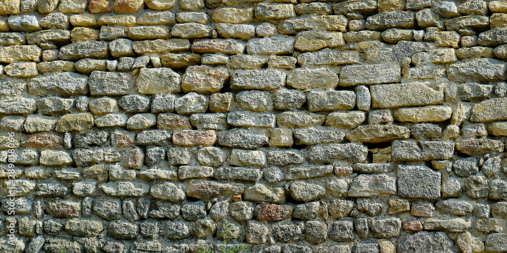 Fototapeta premium close up of wall of stone in the south of france
