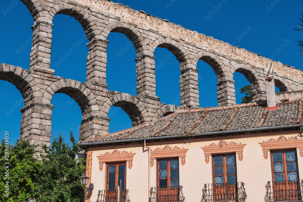 Partial view of the Roman aqueduct located in the city of Segovia, Unesco World Heritage Site, Spain