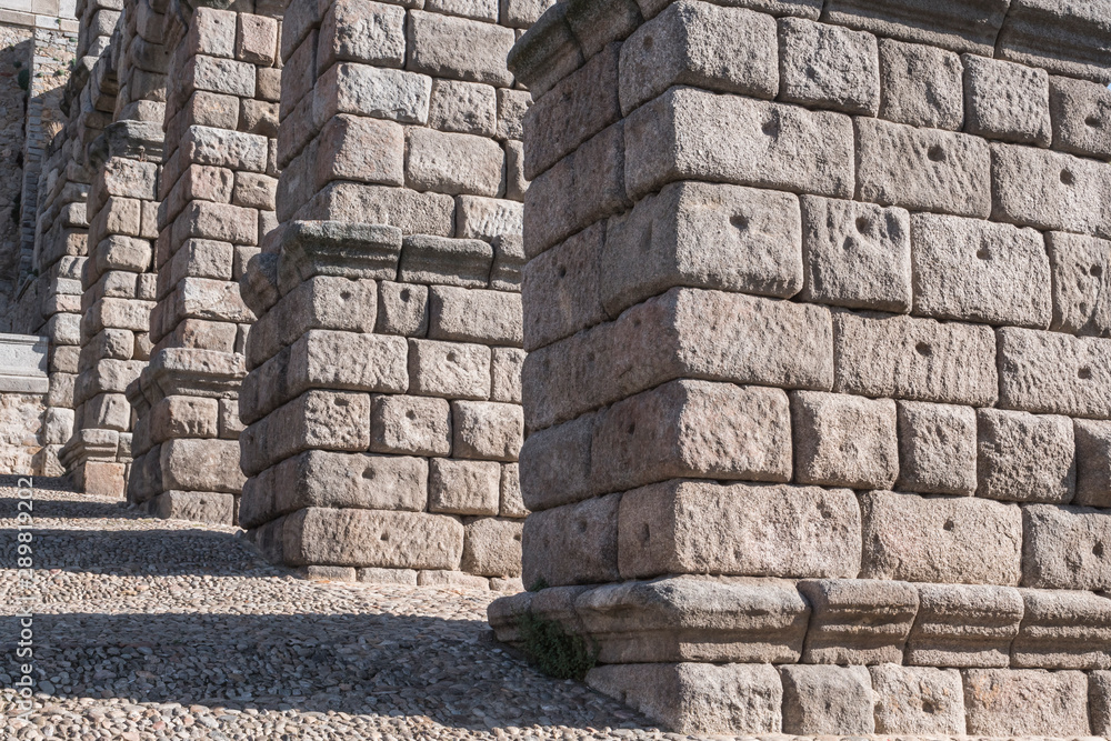 Partial view of the Roman aqueduct located in the city of Segovia, Unesco World Heritage Site, Spain
