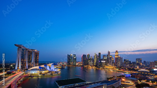 Photography Wide panorama of Singapore skyscrapers at dusk