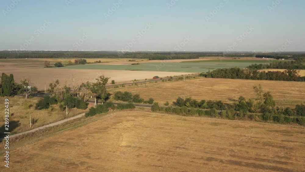 Aerial drone shot of the vast farmlands and meadows in the Ukrainian countryside Aerial drone shot of the vast farmlands and meadows in the Ukrainian countryside