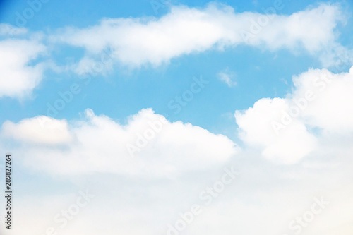 Fantastic soft white clouds against blue sky background soft focus