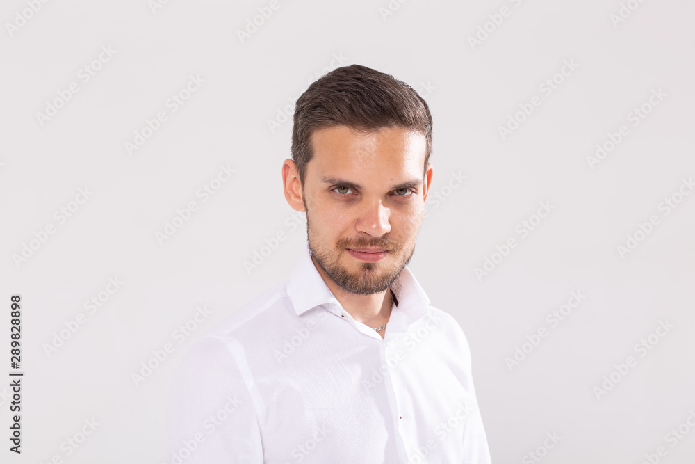 Young casual man portrait isolated on white background Young casual man portrait isolated on white background