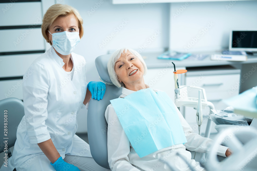Happy adult patient is posing at camera Happy adult patient is posing at camera