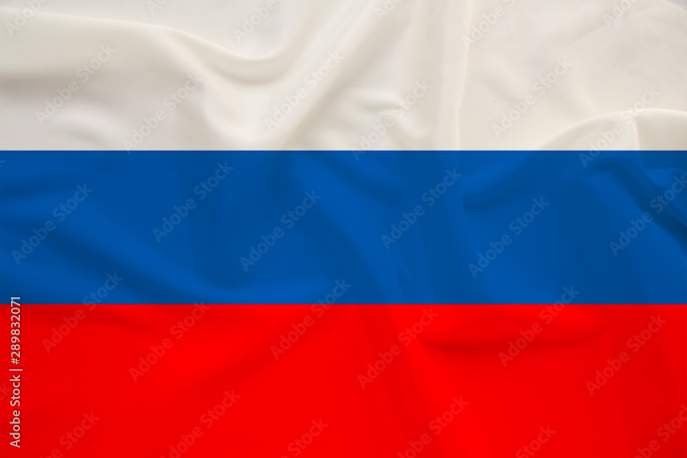 national flag of the country Russia on gentle silk with wind folds, travel concept, immigration, politics