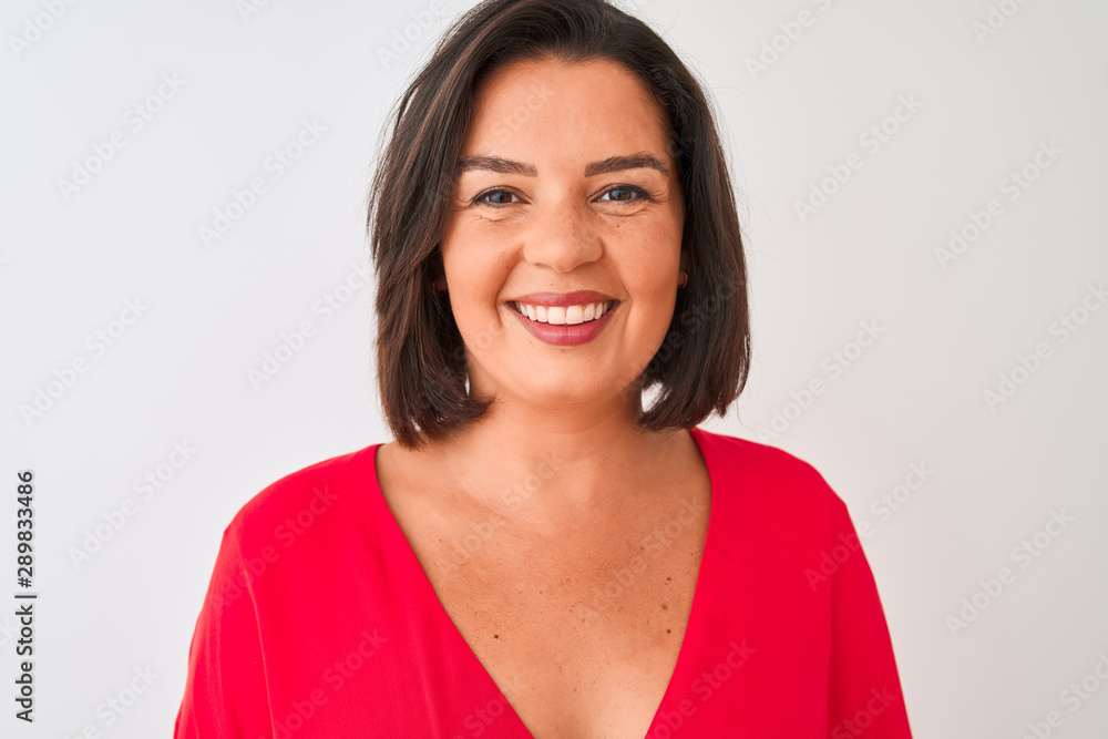 Young beautiful woman wearing red t-shirt standing over isolated white background with a happy face standing and smiling with a confident smile showing teeth Young beautiful woman wearing red t-shirt standing over isolated white background with a happy face standing and smiling with a confident smile showing teeth