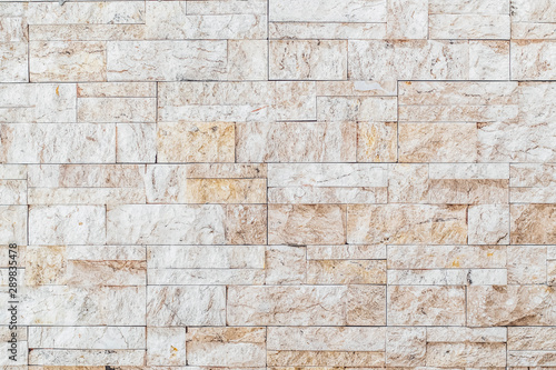 brown white beige travertine wall brick wall art concrete or stone texture background 