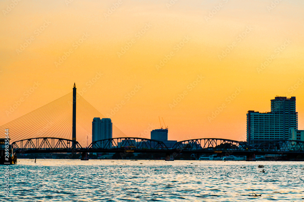 sunrise skyline and landscape of bridge over river  Bangkok Thailand