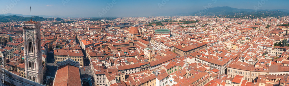 Aerial cityscape of Florence with rooftops and view of Giotto Bell Tower