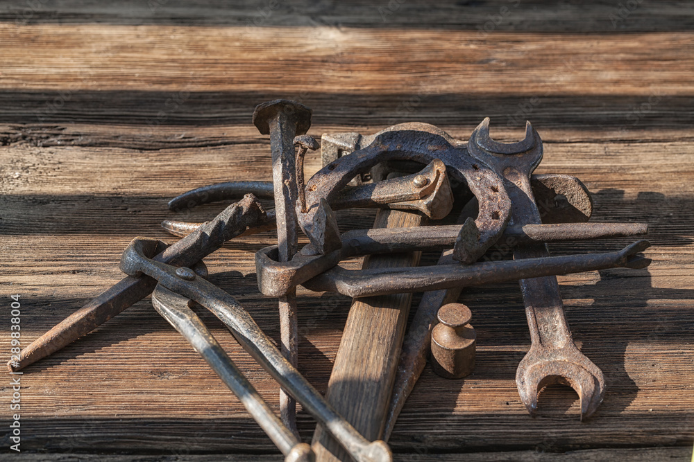 Brutal still life of old iron instruments in the morning sun, Russia Brutal still life of old iron instruments in the morning sun, Russia