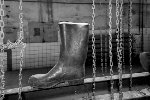 Rubber boots in mining dressing room © Jiri