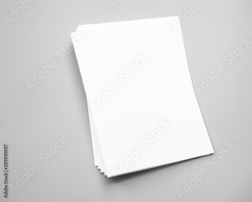 blank book isolated on white background, Poster mock-ups paper, white paper isolated on gray background, Blank portrait A4. brochure magazine isolated on gray, can use banners products business 