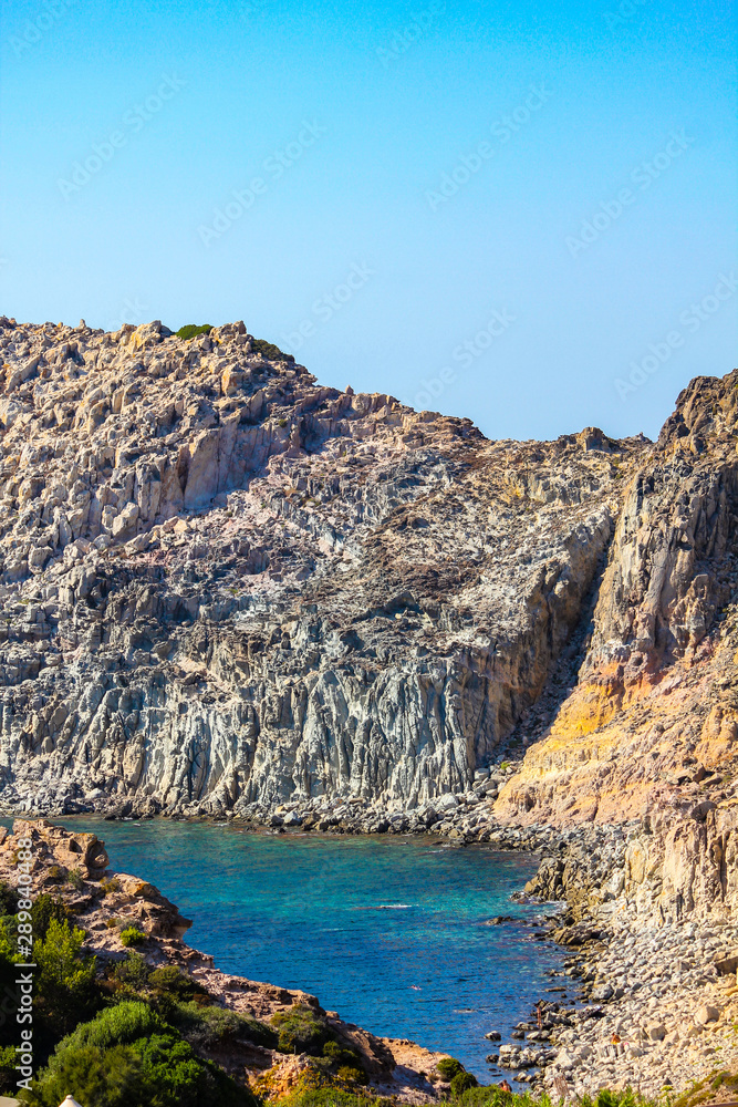 Calafico bay with crystal clear water near Carloforte on the Island of San Pietro, Sardinia