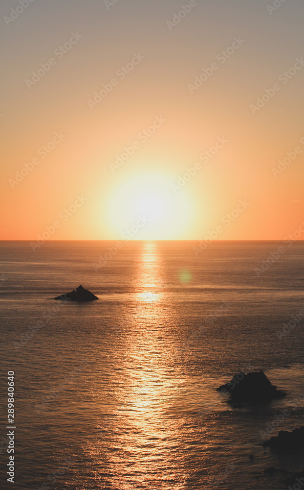 iconic shot of sunset at capo sandalo in the Island of San Pietro, Sardinia