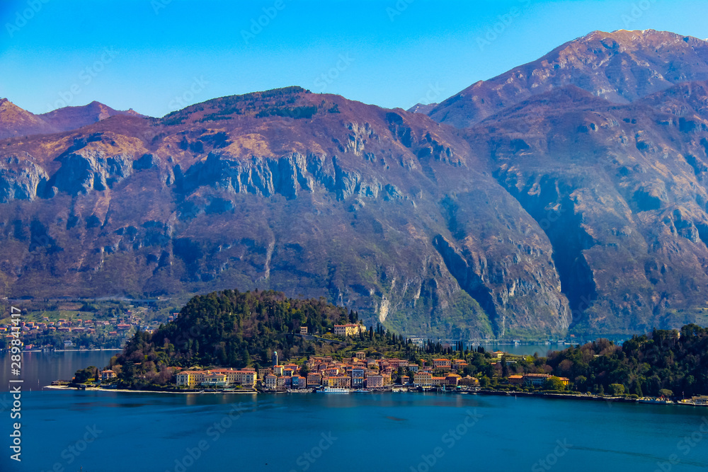 Elevated, panoramic and distant view of Bellagio, famous destination on Como lake in Italy