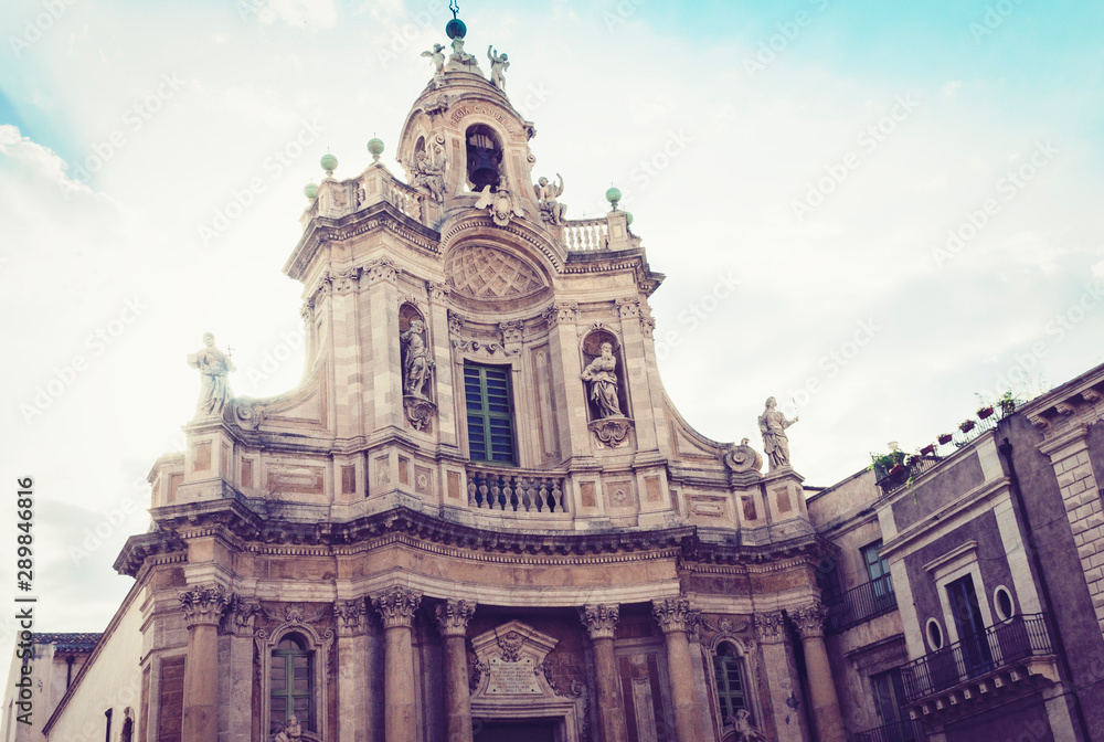 Beautiful cityscape of Italy, facade of old cathedral in Catania, Sicily, Basilica della Collegiata, famouse baroque church.