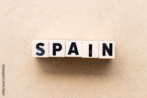 Letter block in word spain on wood background © bankrx