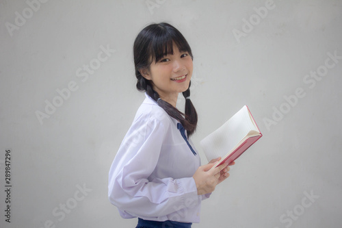 asia thai high school student uniform beautiful girl read a book