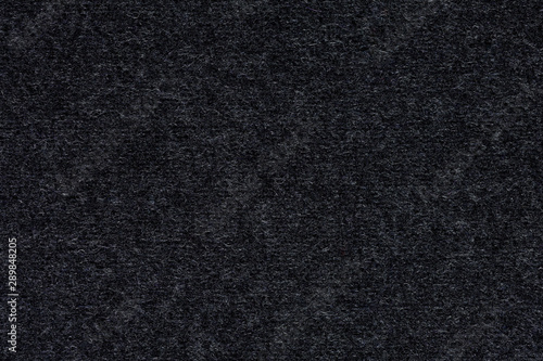 Soft grey textile background. Dark gray background.