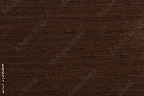 Dark brown venge veneer background as part of your new home project. High quality texture in extremely high resolution. 50 megapixels photo.