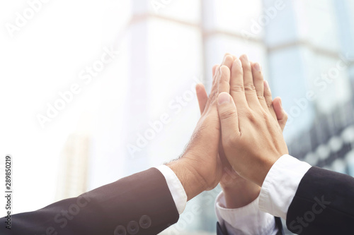 Give me five your clap hands articulate group businessman for good business team. concept Success and encouragement to overcome and overcame obstacles business solution strategy.