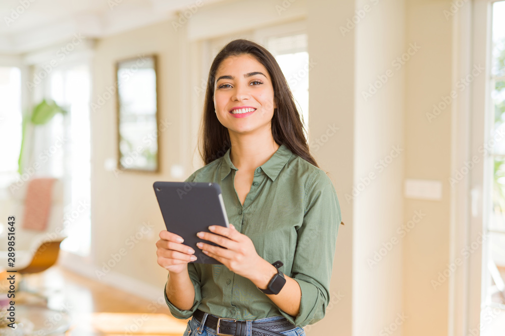 Beautiful young woman working using touchpad tablet Beautiful young woman working using touchpad tablet
