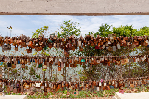 Key lock on the sling wire. Love memories,Valentines Day. Lovers hang master key for truely love. photo