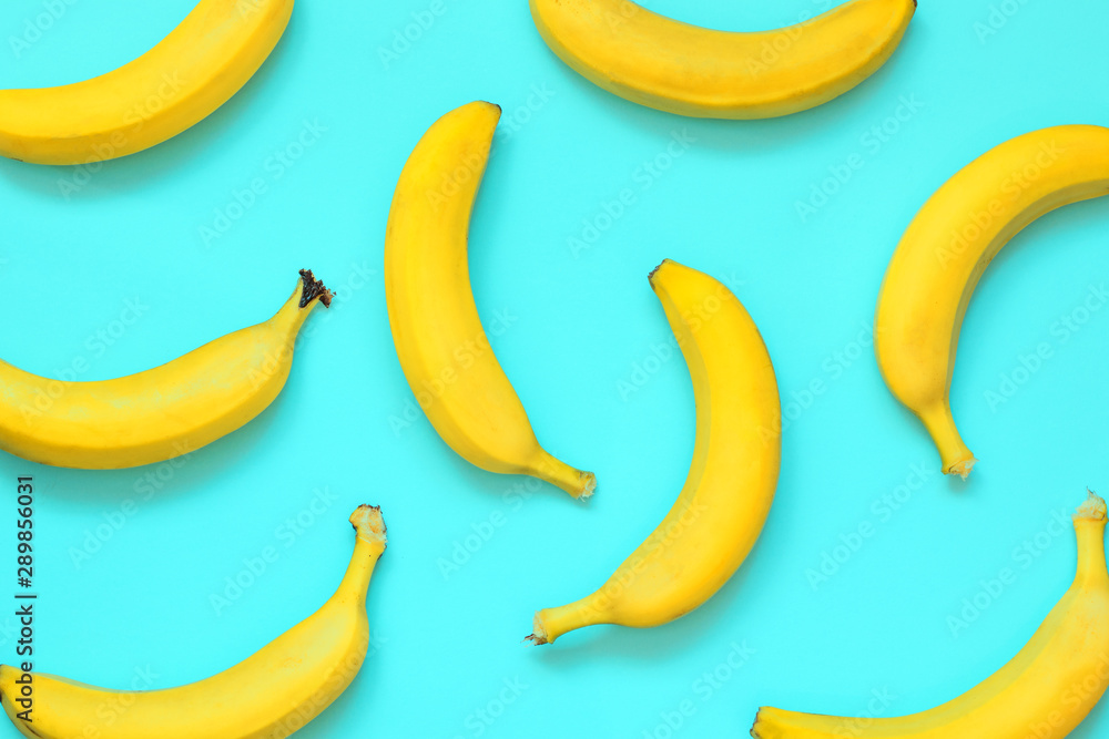 ripe bananas on blue background