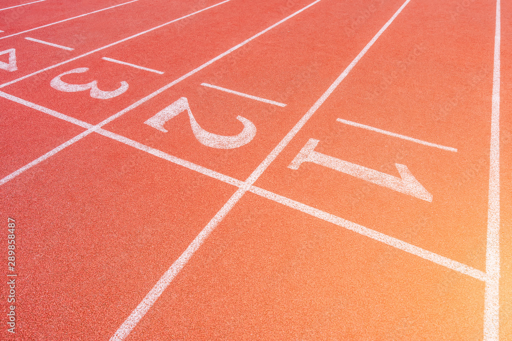 Close up of the stadium's red track Close up of the stadium's red track