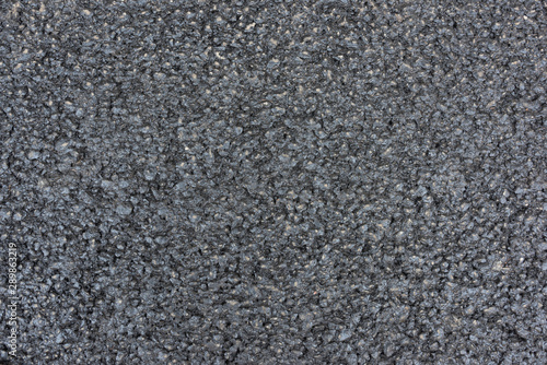 Brand new black asphalt pavement texture background