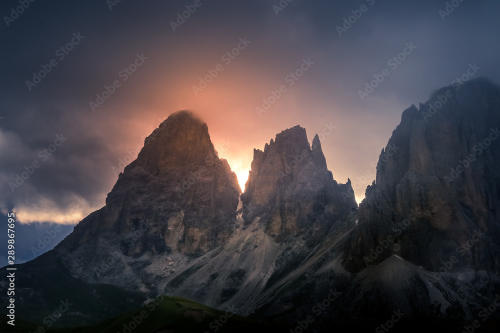 a colorful stormy sunset over Dolomite Pass