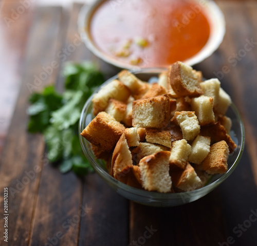 traditional tomato soup with herbs and croutons