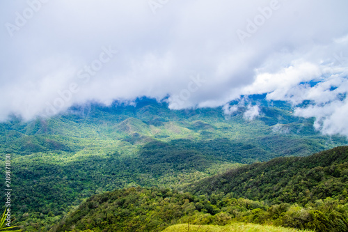 Viewpoint and green fields in the rainy season cover by fog at Doi Luang Tak, Tak Province,Thailand.