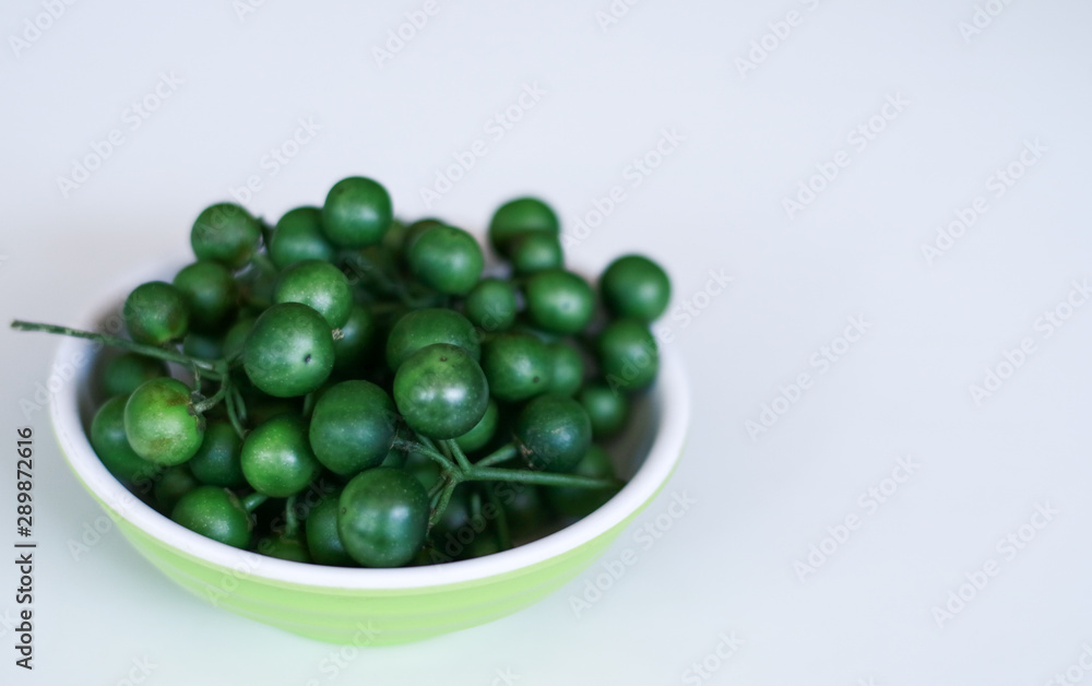 Leunca or Solanum nigrum on white background. Leunca or Solanum nigrum on white background.