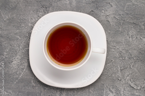 Cup of tea on concrete stone background