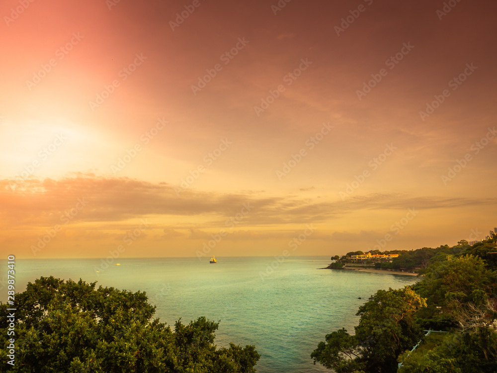 Before sunset twilight sky and red green color sea at pattaya beach, Thailand.