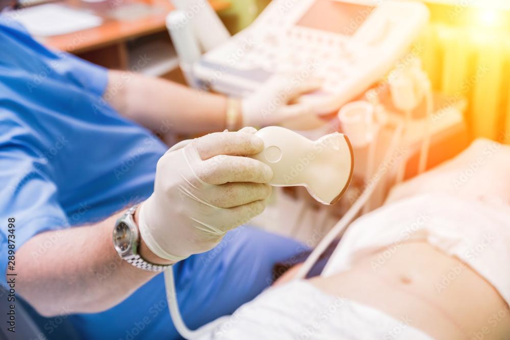 Ultrasound scanner in the hands Ultrasound scanner in the hands