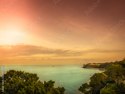 Before sunset twilight sky and red green color sea at pattaya beach  Thailand.