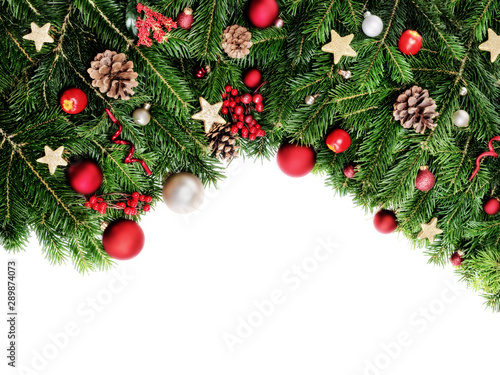 Christmas decorative background border with red bauble decorations and holly berries