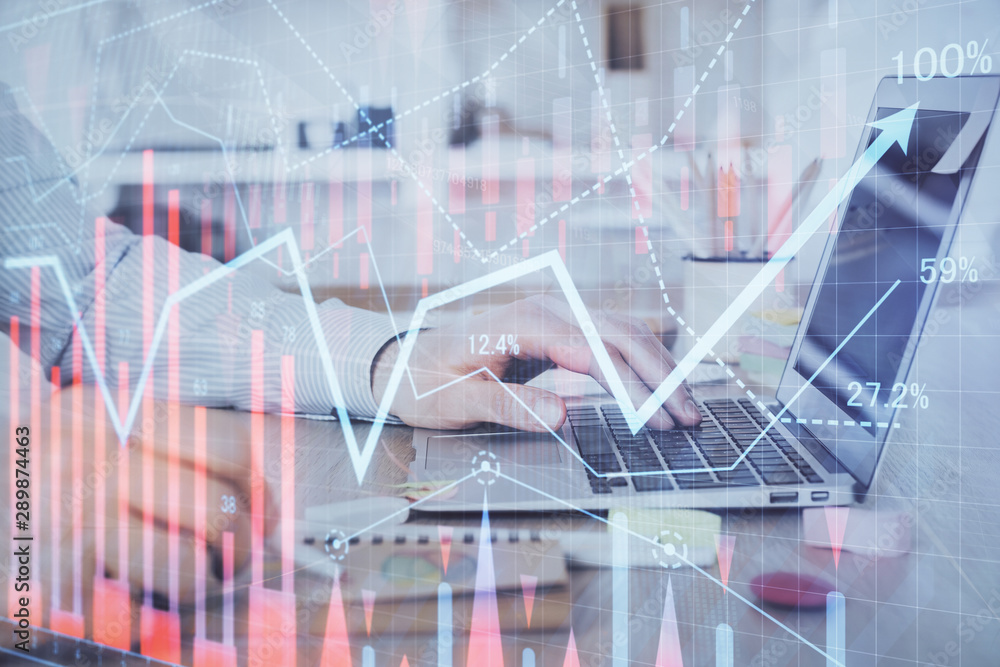 Multi exposure of stock market chart with man working on computer on background. Concept of financial analysis. Multi exposure of stock market chart with man working on computer on background. Concept of financial analysis.