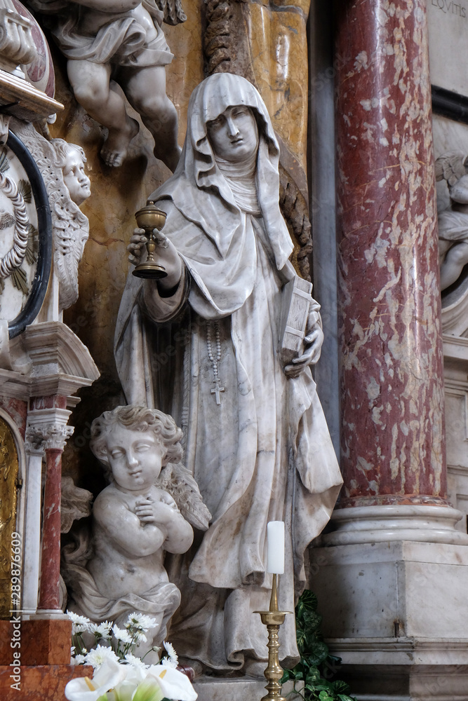 Fototapeta premium Saint Clare of Assisi, statue on the High Altar in the Catholic Church of the Saint Clare in Kotor, Montenegro