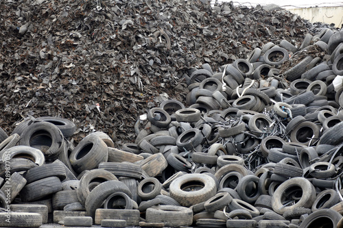 Tire Recycling Plant / Pile of tires prepared for recycling at the factory