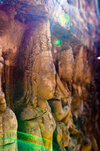 stone carved cambodian figure 