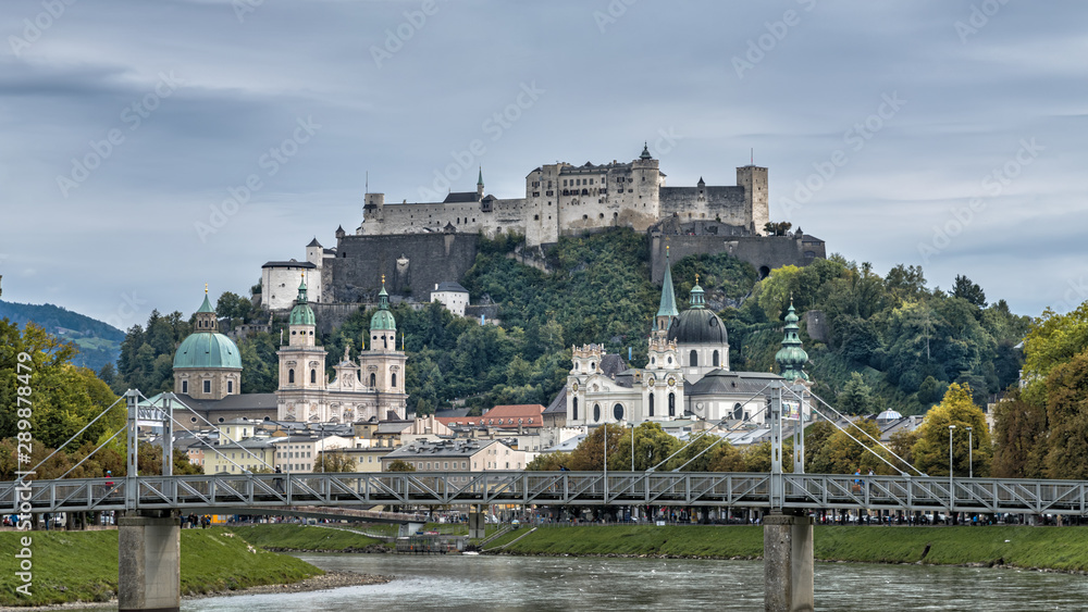 City panorama of historical sights in baroque city Salzburg, Austria. Autumn city landscape with Festung Hohensalzburg and Salzach river