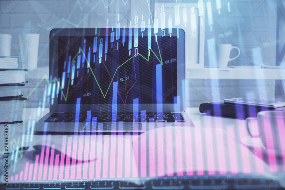 Stock market graph and table with computer background. Double exposure. Concept of financial analysis. Stock market graph and table with computer background. Double exposure. Concept of financial analysis.