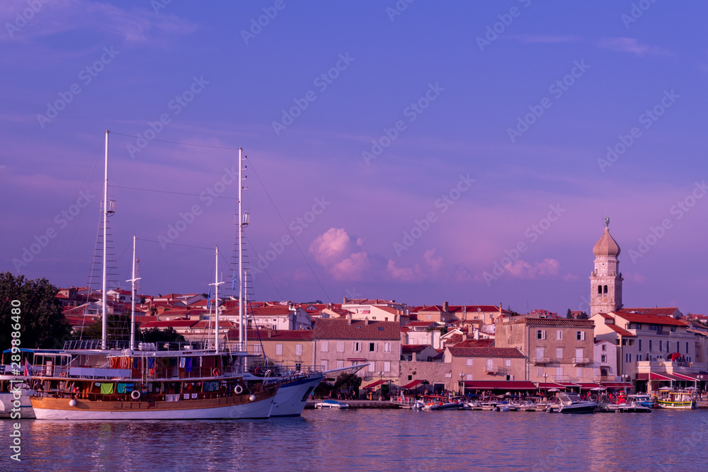 Fototapeta premium Evening view of the pier of the old city. Krk, island of Krk, Croatia.