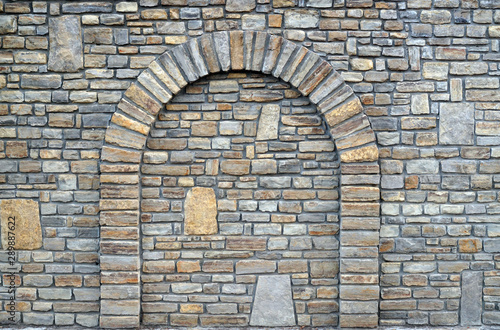 Obraz na płótnie Walled-up archway in a stone wall w salonie