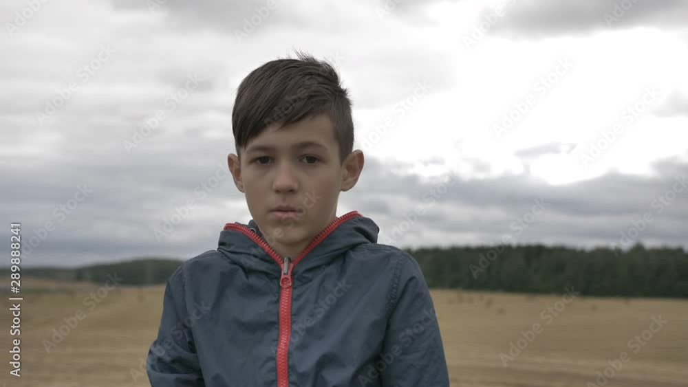 portrait of a surprised boy in autumn outdoors portrait of a surprised boy in autumn outdoors