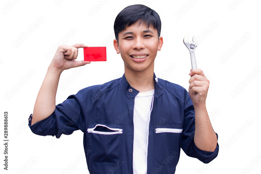 A man is holding card and wrench for payment of car service maintenance A man is holding card and wrench for payment of car service maintenance